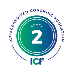 Circular badge with the text “ICF-Accredited Coaching Education” around the edge, “Level 2” in the centre, and the ICF logo at the bottom. Colours are gradient shades of blue and green.